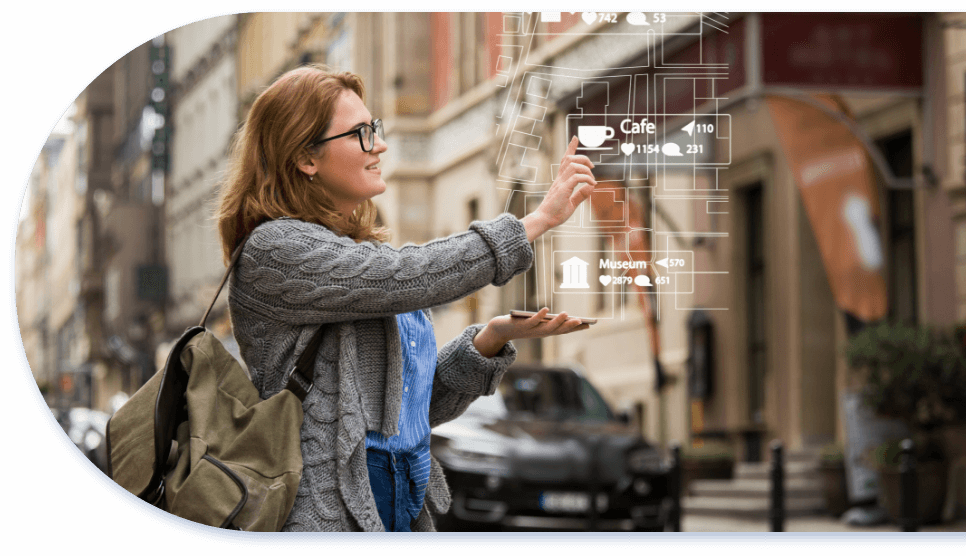 woman on city sidewalk pointing to augmented reality map showing destinations