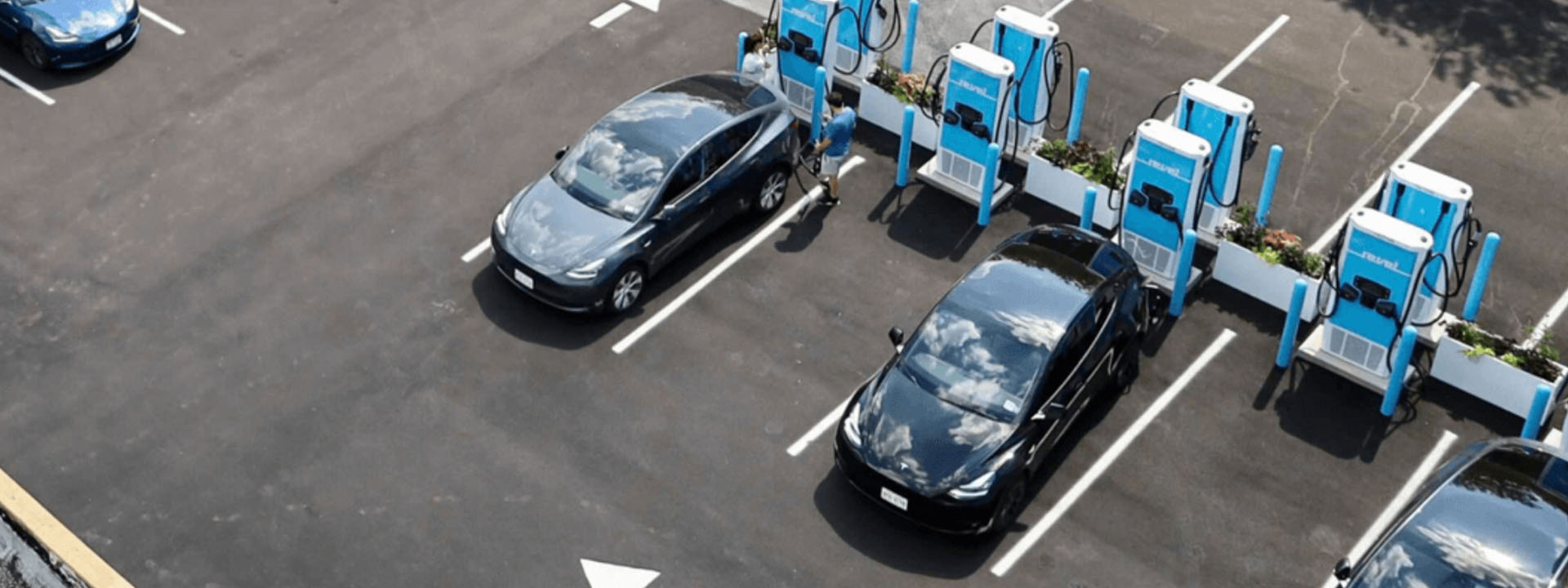 parking lot with cars charging